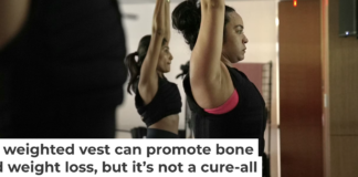 Jannelliz Barragan, center, wears a weighted vest during a workout class in New York on Aug. 13, 2025. AP Photo/Shelby Lum
